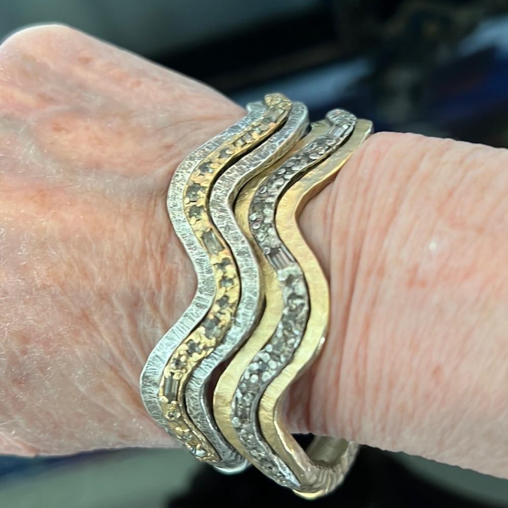 Set of two stackable metal hammered statement bracelets